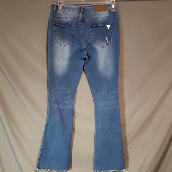 Stylish Distressed Blue Flare Jeans - Picture 3 of 5